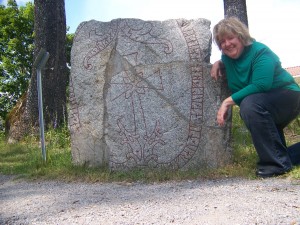 Kelly makes friends with a Swedish runestone